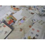 A large quantity of stamps and envelopes.