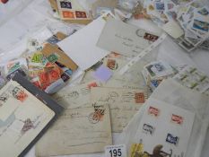 A large quantity of stamps and envelopes.