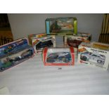 A quantity of boxed die cast including Britains 9761 helicopter, Burago etc.