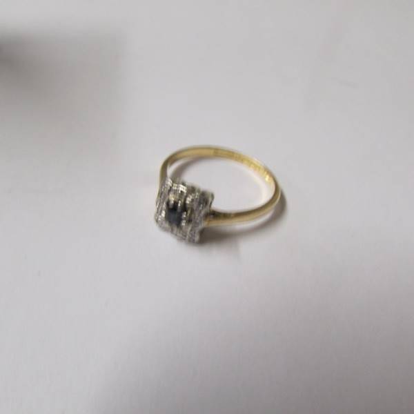 A diamond and sapphire square cluster ring dated Birmingham 1941 in 18ct gold, size L. - Image 2 of 2