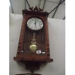 An Acctim quartz Westminster chime wall clock.