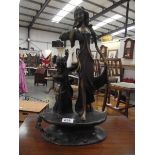 An art nouveau style bronze mother and child, 18" tall.