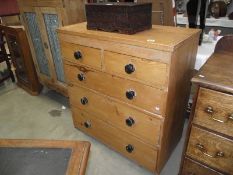 A Victorian pine chest of drawers.