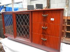 A low 3 drawer leaded cabinet.