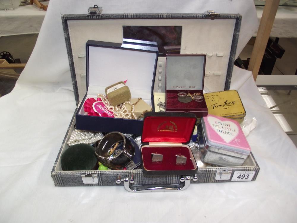 A jewellery case and mixed costume jewellery etc.