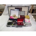 A jewellery case and mixed costume jewellery etc.