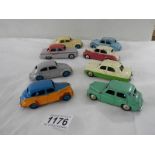 Eight 1950's Dinky saloon cars.