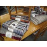 5 new recycled wool rugs, 2 dog draught excluders and 2 throws.