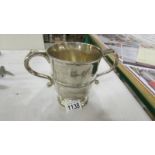 A solid silver 2 handled pot, 615 grams, 21.9 ounces.