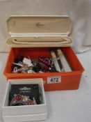 A mixed lot of costume jewellery, letter opener etc.