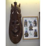 A hand carved wall mask from Senegal,