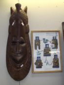 A hand carved wall mask from Senegal,