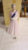 A boxed Coalport figurine commemorating Queen Elizabeth II 80th Birthday'