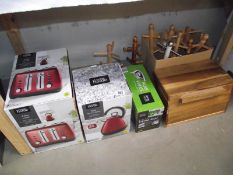 A quantity of new kitchen items including toaster, kettle,