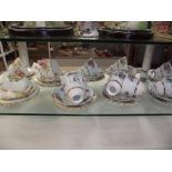 A selection of Colclough floral tea cups,