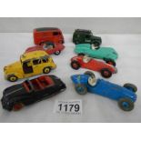 Eight 1950/60's Dinky cars and commercials including Austin, Jaguar etc.