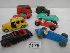Eight 1950/60's Dinky cars and commercials including Austin, Jaguar etc.