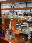 3 shelves of glass ware.