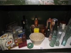 A Lovatts stoneware jelly mould and quantity of old bottles and tins etc.