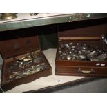 2 oak cutlery boxes and a large lot of loose cutlery
