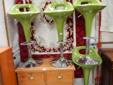 4 good retro style green bar stools.