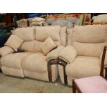 A reclining sofa and matching chair.
