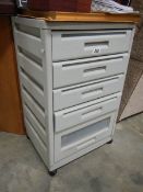 A 5 drawer plastic chest.