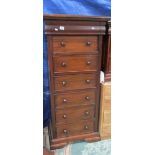 A 7 drawer mahogany chest.