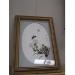 A framed and glazed 3D collage picture with flowers and butterflies