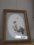 A framed and glazed 3D collage picture with flowers and butterflies