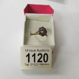 A 9ct gold amethyst cluster ring, size N.
