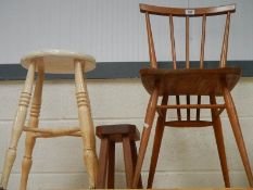 An Ercol kitchen chair, a stool and an early 20th century stool.