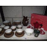 A part Denby coffee set including salt and pepper,