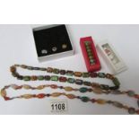 2 natural stone necklaces and a quantity of 'Love Links' beads.