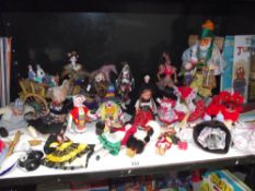 A good selection of vintage dolls in National dress etc.