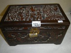 A Carved Camphor wood box, 33 x 18 x 20 cm.