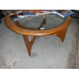 A circular glass topped table.