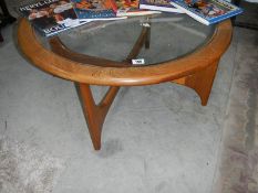 A circular glass topped table.