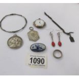 A pair of pendant earrings, a Delft brooch, a watch head, medallions etc.
