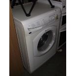 A Hotpoint Aquarious washing machine (6 kg load).