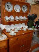 A pine open rack dresser.