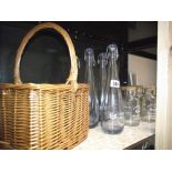 A wicker bottle basket, 6 cod bottles, quantity of storage jars etc.