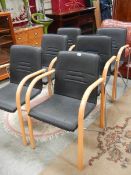 A set of 6 retro style stacking chairs.