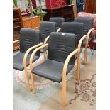 A set of 6 retro style stacking chairs.