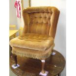 A deep buttoned draylon nursing chair