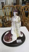 A Royal Worcester figurine 'Queen Elizabeth, The Queen Mother in her Coronation Robes', 249/2500.