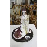 A Royal Worcester figurine 'Queen Elizabeth, The Queen Mother in her Coronation Robes', 249/2500.