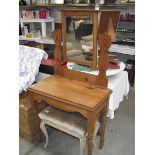 A solid pine mirror back dressing table.