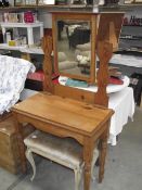 A solid pine mirror back dressing table.