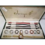 A boxed Titoni colorscope 9 wristwatch with interchangeable bezels and straps